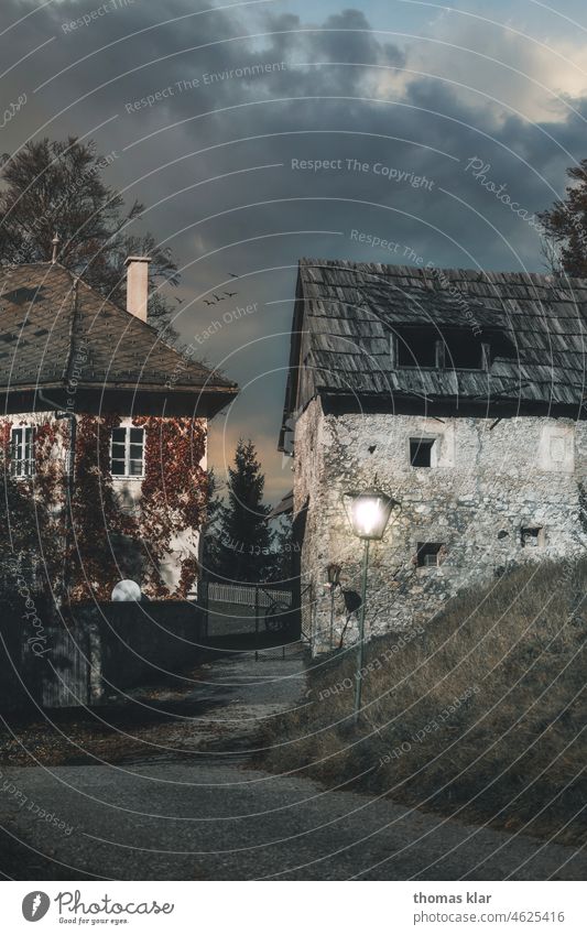 Two old houses at dusk House (Residential Structure) Evening Twilight Lantern Light Sky Country life finkenstein castle Stone wall