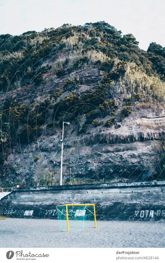 Soccer field in the Azores Central perspective Deep depth of field Sunlight Reflection Contrast Shadow Copy Space middle Copy Space bottom Copy Space right