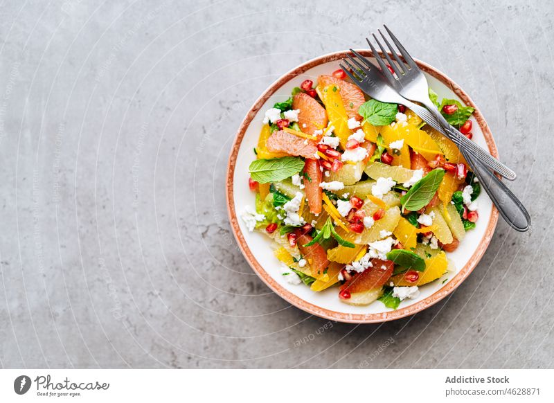 Salad with tomatoes and feta cheese salad traditional pomegranate mint greek dish cuisine culinary delicious food meal tasty serve table palatable lunch