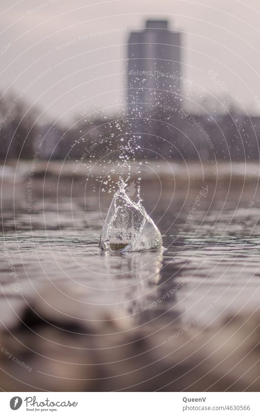 Water splashes And droplets in winter on the Elbe, Dresden Drops of water River River bank Flow Reflection Fresh Town Nature Winter Playing Elbufer