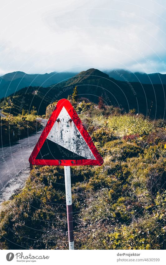 Warning sign slope in Azores Central perspective Deep depth of field Sunlight Reflection Contrast Shadow Copy Space middle Copy Space bottom Copy Space right