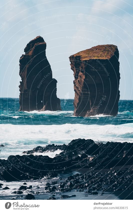 Waves on the shore and rocks in the Azores Central perspective Deep depth of field Sunlight Reflection Contrast Shadow Copy Space middle Copy Space bottom