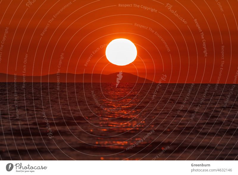 UK Walney Island. Sunset view across the Irish Sea towards the distant Isle of Man. walney walney island walney sunset walney island sunset cumbria