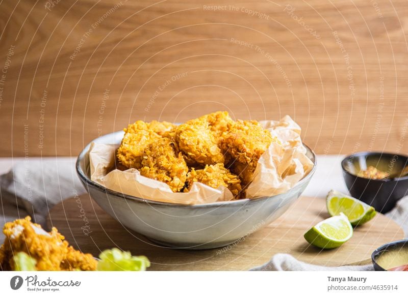 vegan fried nuggets in a bowl with sides Frying Lunch Cooking Gourmet tofu vegan protein Fresh Fried chicken rustic Bowl Nutrition vegan nuggets cornflakes