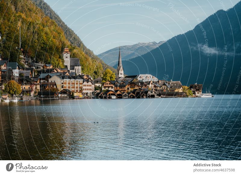 Old town near lake and mountains village nature settlement forest landscape austria salzburg travel slope water autumn fall picturesque tower tourism old