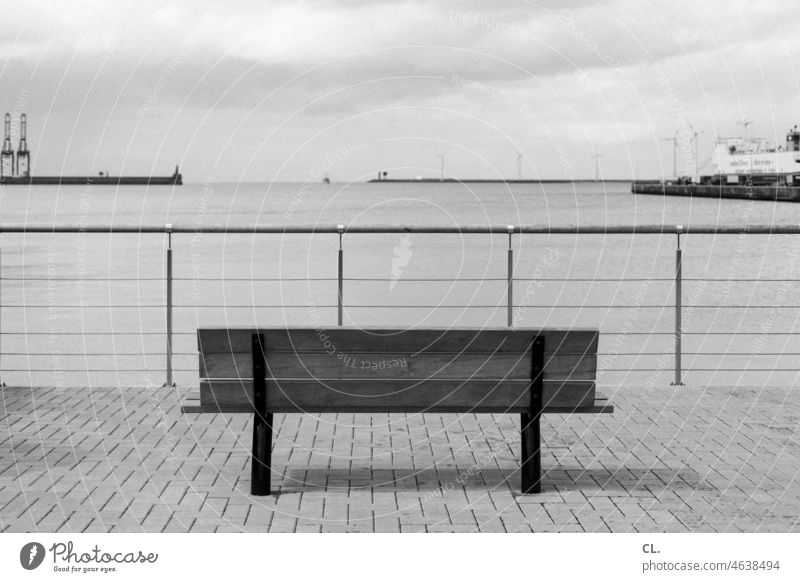 port bank Bench Harbour Port area Fence Vantage point Water Ocean Loneliness Deserted coast