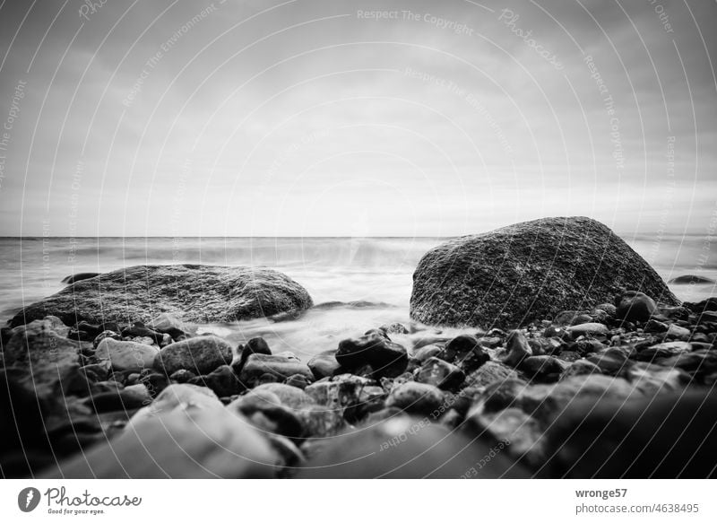 Stones on the beach of the Baltic Sea II Baltic beach stones Boulders Wet Cold Glittering flints chicken gods Ocean Beach coast Nature Water Waves Landscape Sky