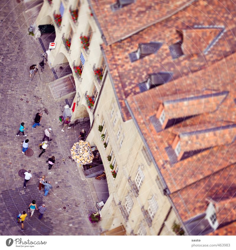 Photographer and parasol Sightseeing City trip Human being Old town House (Residential Structure) Going Vacation & Travel Historic Kitsch Small Above Joy