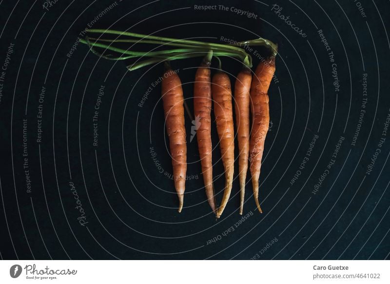 Organic carrots dark mood ingredient Vegan Food vegan organic healthy vegetarian verdura orgánica zanahorias orange vegetables food styling Food photograph