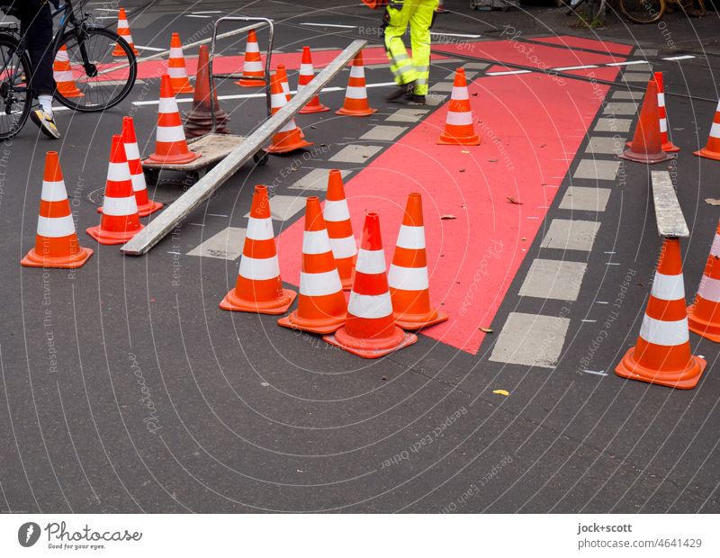 worn out | bike lanes are made fresh again Lane markings Cycle path Street Asphalt Traffic cone New Traffic infrastructure Pylon Dashed line Schönhauser Allee