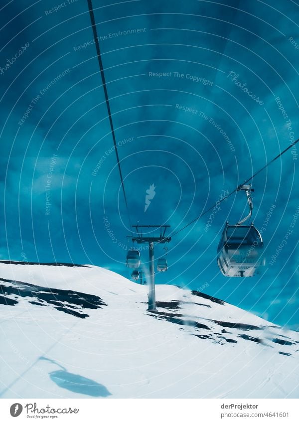 View of snow covered landscape from gondola in Neukirchen Snowscape Mountain range Panorama (View) Long shot Deep depth of field Sunlight