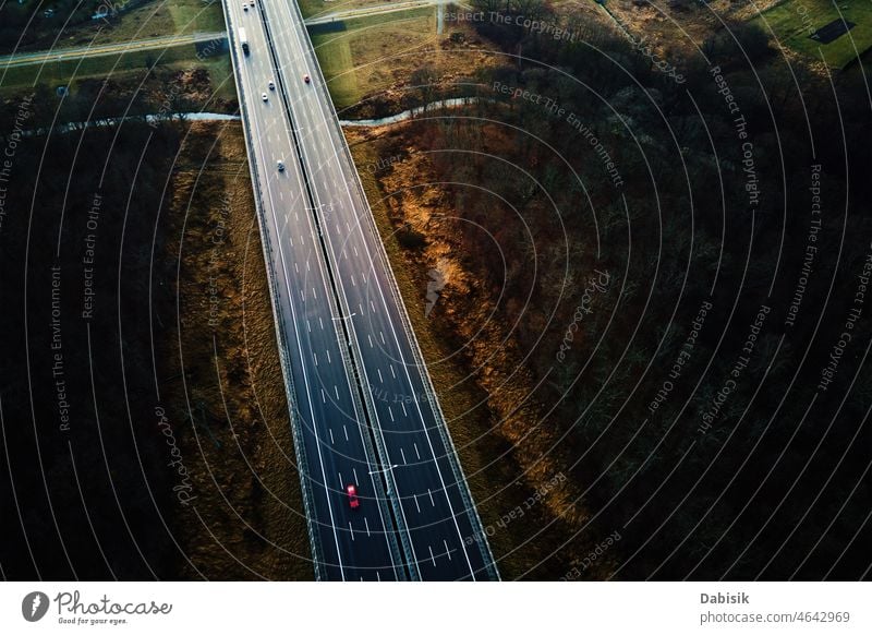 Aerial view of highway with moving cars road transport traffic aerial travel transportation driving logistic asphalt landscape background top country outdoor