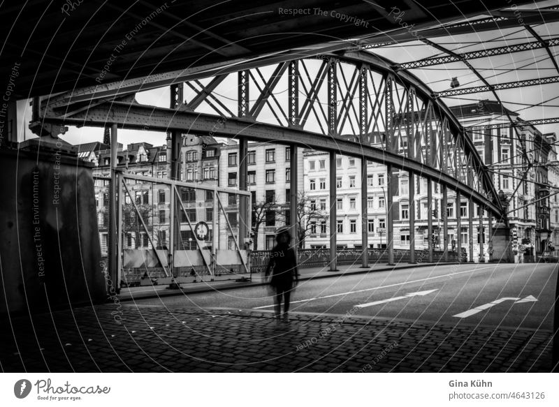 Lonely woman (blurred) walking across the street Woman Tourist Architecture Manmade structures To go for a walk Port City Hamburg Landmark Harbour