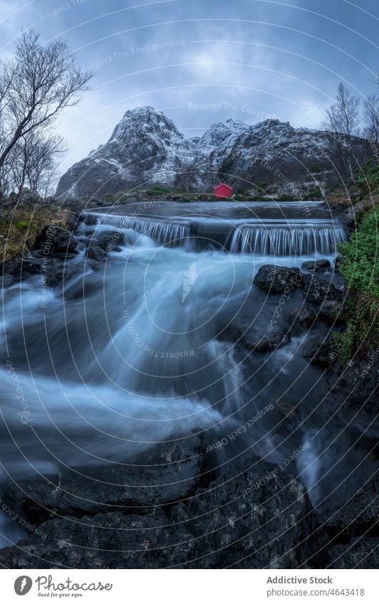 Sea flowing against rough mountain sea coast shore archipelago water nature rocky overcast boulder environment scenery marine natural scenic norway lofoten aqua