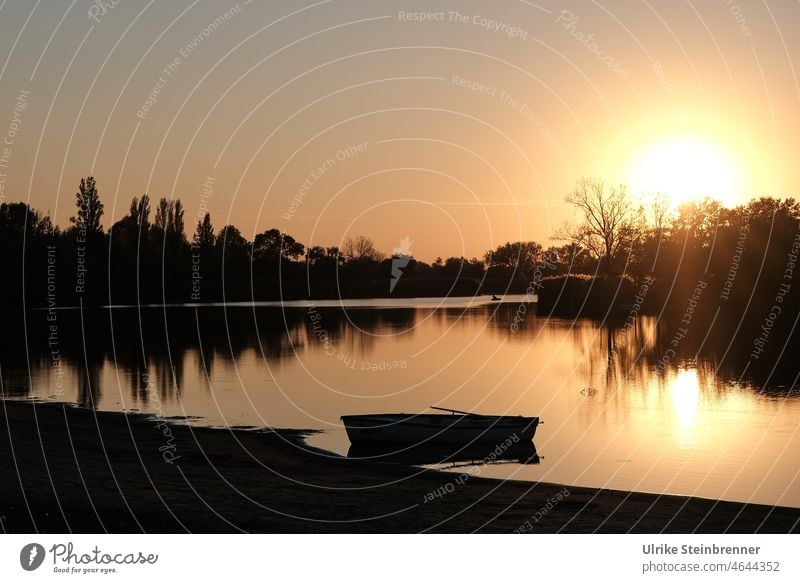 Sunset at Szelid lake, Hungary Lake Water boat Motor barge reflection evening mood trees bank Fishing boat atmospheric romantic Sunlight Back-light