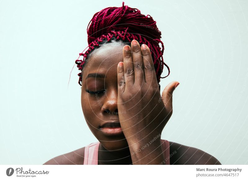 woman covering her eye with her hand abused woman adult attractive background beautiful beauty black brunette clean close closeup composition concept cool cute