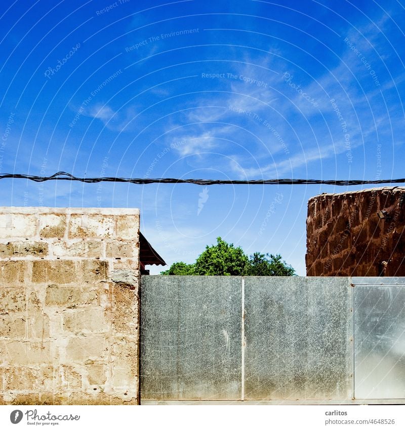 There I stand, poor fool, and I am as closed as before! | Closed yard gate in Santanyi Spain Balearic Islands Majorca Wall (barrier) Goal Stone Metal locked