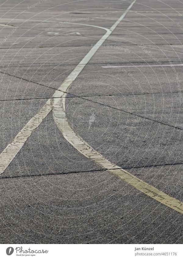 Asphalt and lines at Tempelhofer Feld, Berlin Ground Asphalt road Gray Yellow Stripe Geometry geometric Flat flat abstraction Pattern Town urban cityscape