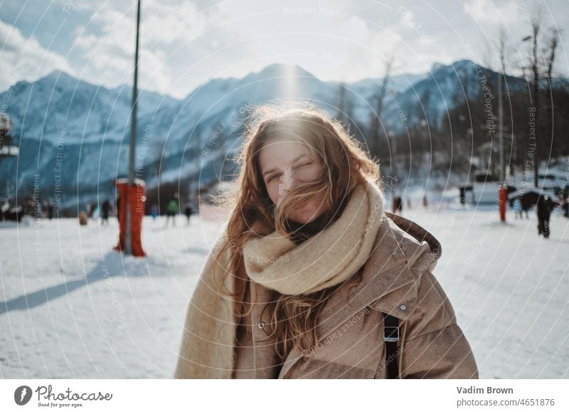 Smilling girl in the mountains Girl Beautiful Attractive snow winter portrait female cold nature Woman white people outdoors christmas time young woman