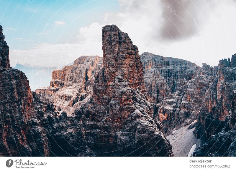 Rock needle in the mountains of South Tyrol Panorama (View) Central perspective Deep depth of field Silhouette Contrast Light (Natural Phenomenon) Sunbeam