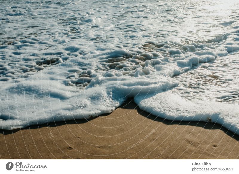 White spray on the beach High tide Water Sand coast White crest Vacation & Travel Waves Surf Ocean Beach Deserted Summer water spray Cold Foam