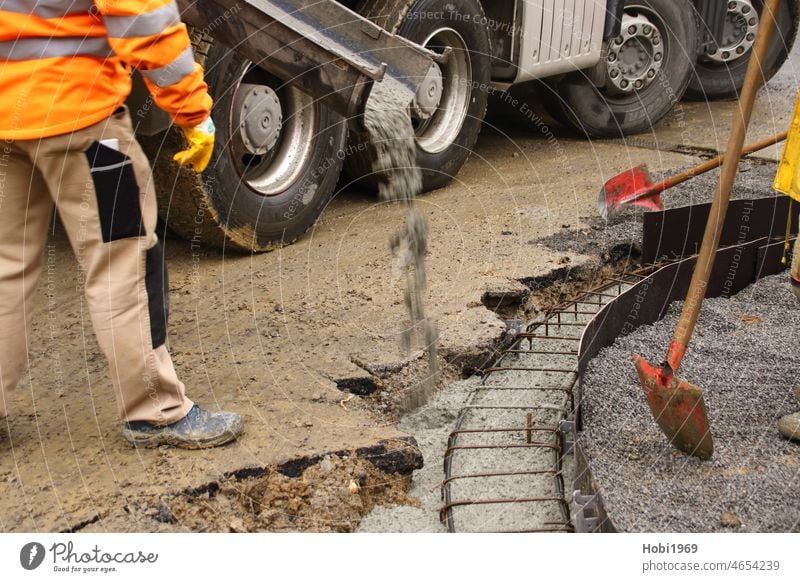 Filling a strip foundation with liquid concrete fill in Strip foundation Foundations Stripe Concrete fluid Cement Sand Water Transport Steel Construction steel