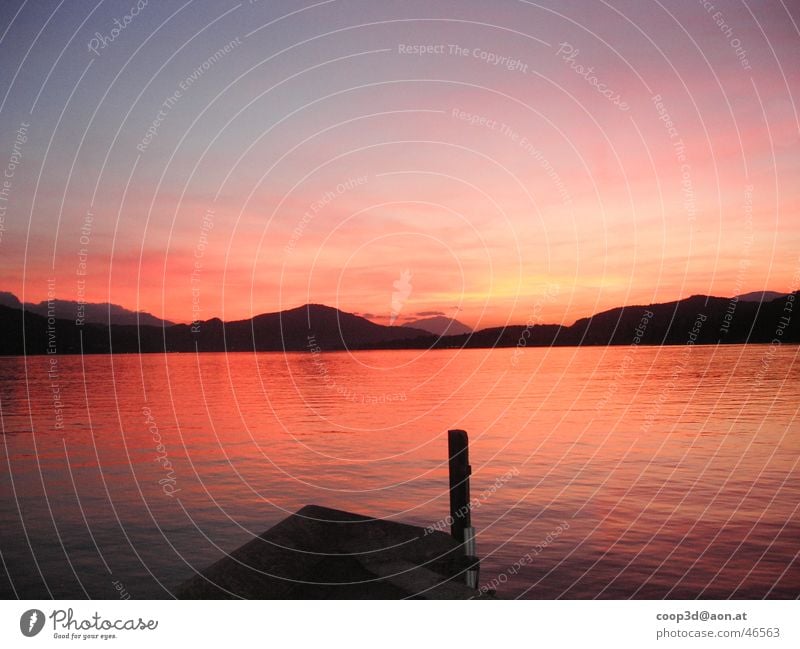 dusk Twilight Footbridge Lookout tower Calm Evening Water Mountain Lake Wörthersee