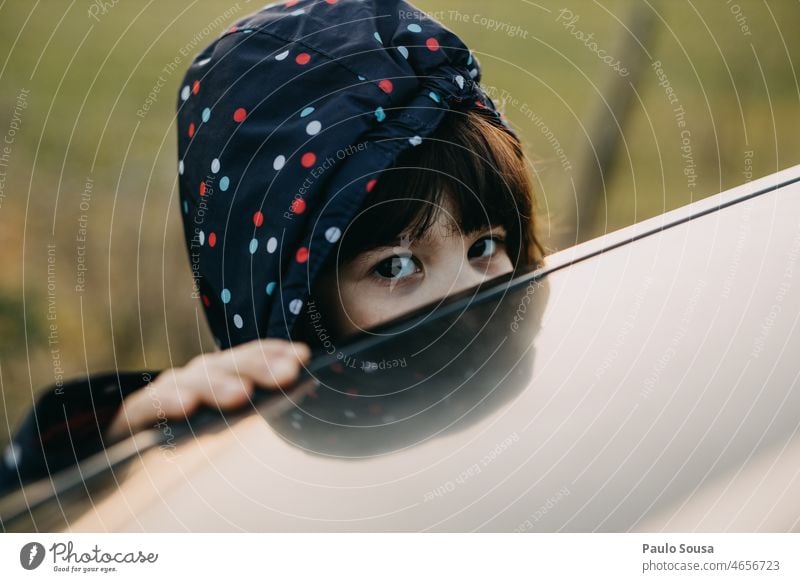 Close up girl eyes Child Girl 3 - 8 years Infancy Colour photo Feminine Blue Playing Human being Exterior shot Nature peek a boo Happiness Joy Day Happy