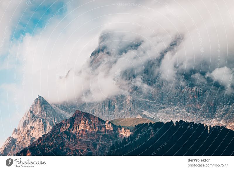 Clouds in the Dolomites with view of the mountains Experiencing nature Tourism Panorama (View) Sunrise Deep depth of field Long shot Sunbeam