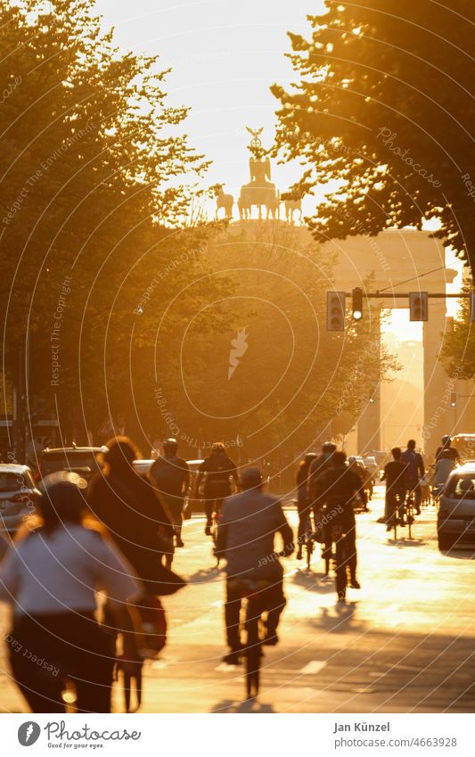 Bicyclists at the Brandenburg Gate in Berlin rush hour traffic Cycling Bicycle Cyclist Transport Commuter Rush hour turnaround mobility turnaround Mobility