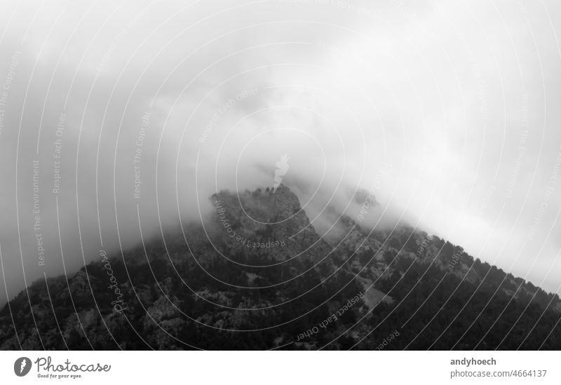 The Tramuntana mountains near the village of Biniaraix on the island of Mallorca adventure balearic black and white cloudy copy space dramatic environment