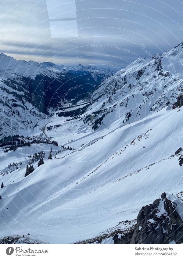 Panoramic view from a gondola called Flexenbahn on a cloudy day on the Arlberg mountain Gondola Gondola lift Ski lift Panorama (View) Panorama (Format)