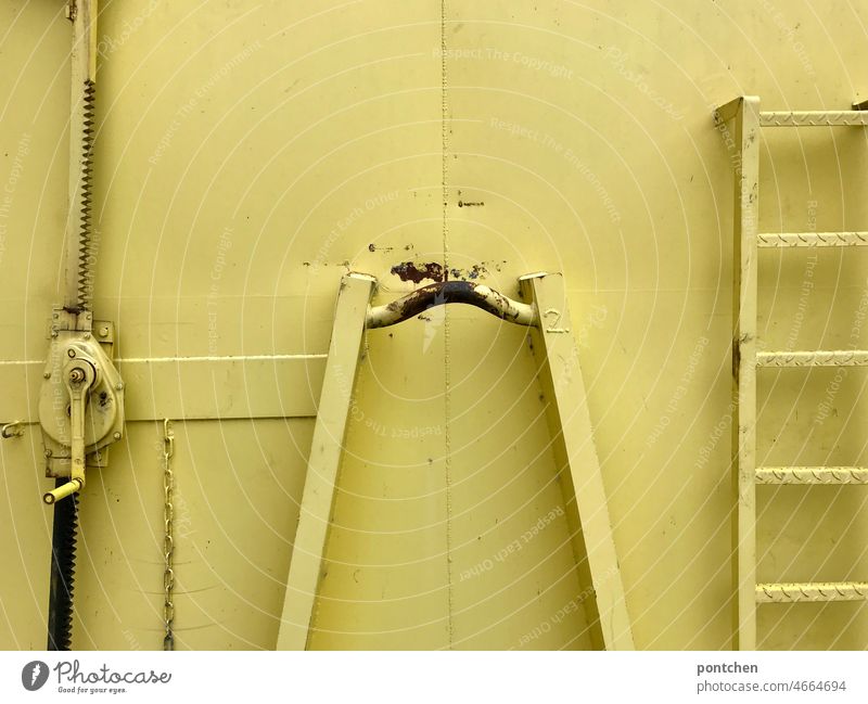 All in yellow. A rusted container with a ladder. Monochrome Container Yellow pastel construction works Disposal Industry Construction site Metal Workplace