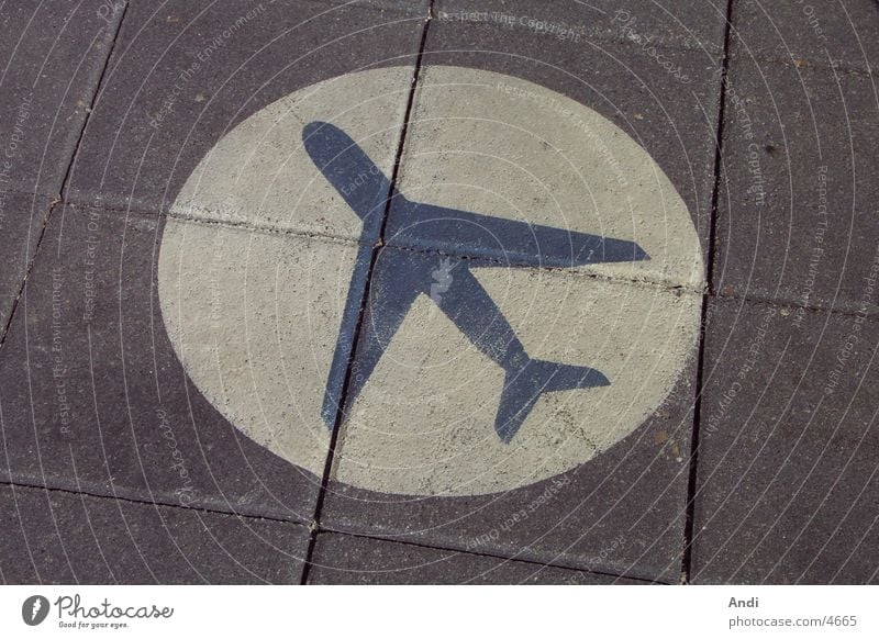 tarpaulin Airplane Lettering Icon Photographic technology Floor covering Signs and labeling Road marking