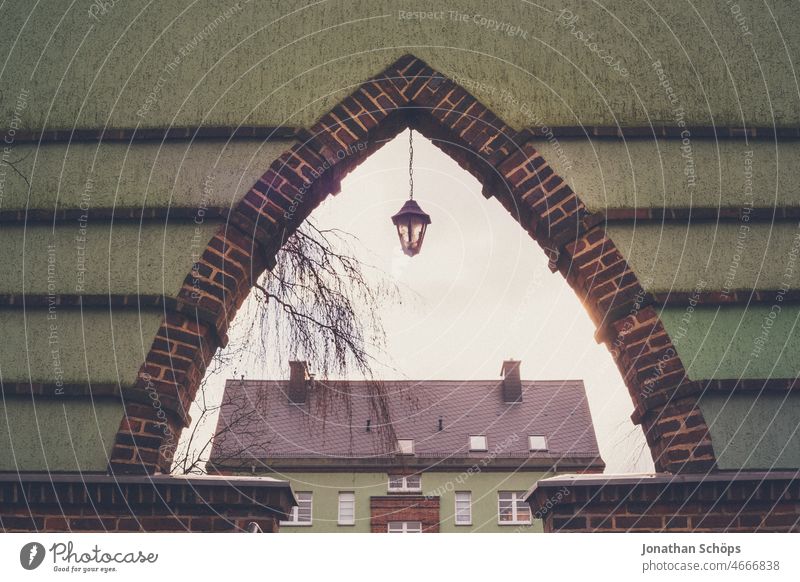 View through wall Vista Wall (barrier) Sky Back-light Sunlight housing unit dwell Residential area Architecture Triangle Archway Window arch shape pretty Baun