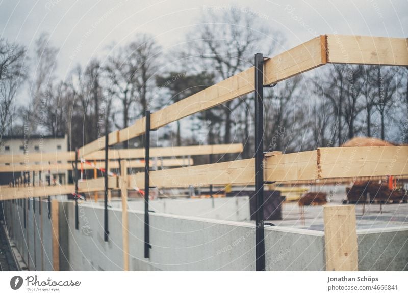 temporary wooden railing on carcass on construction site makeshift unfinished Construction site Build Craft (trade) Safety Concrete Cellar