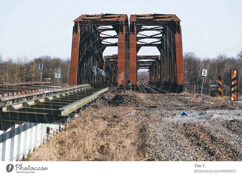 an old railroad bridge over the Oder Border Poland Brandenburg Bridge Railway bridge Winter Exterior shot Architecture Railroad tracks Sky Historic Colour photo