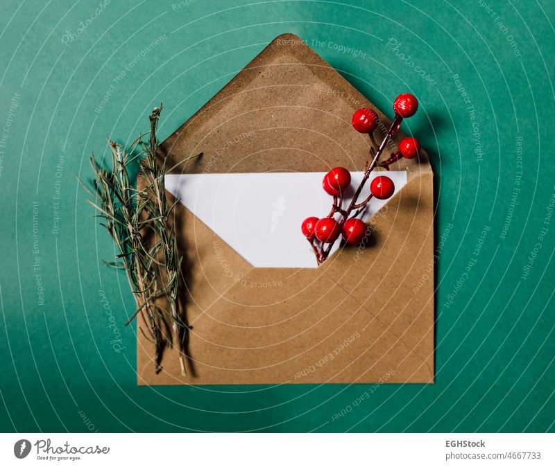 Card craft where to write a letter with dry thyme plants on green background. Focus on paper kraft anniversary blank board copy space design document empty