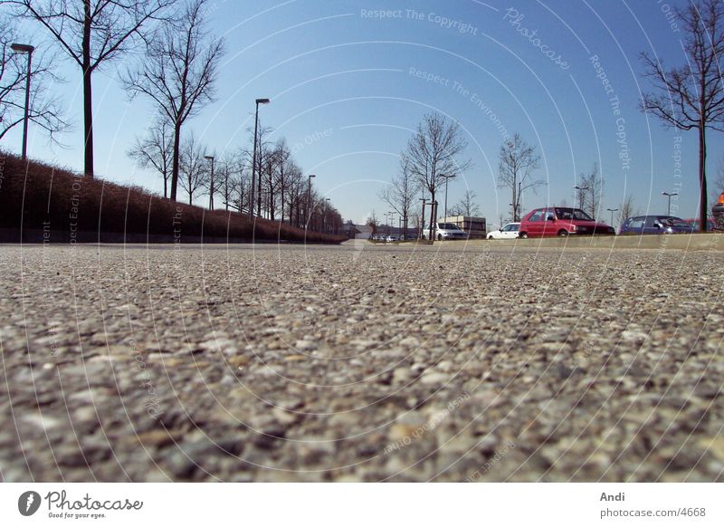 parking space Parking lot Photographic technology Car Floor covering Perspective