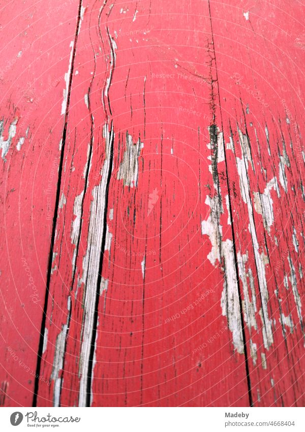 Splintering red color of an old wooden table in summer at the harbor 2 in Offenbach am Main in Hesse, Germany Table Wooden table Garden table Bistro table