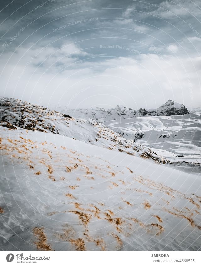 Melchsee Frutt in the Swiss Alps Mountain Snow Winter Sky Clouds Blue Cold Vantage point Peak Panorama (View) Snowcapped peak Landscape Nature Deserted