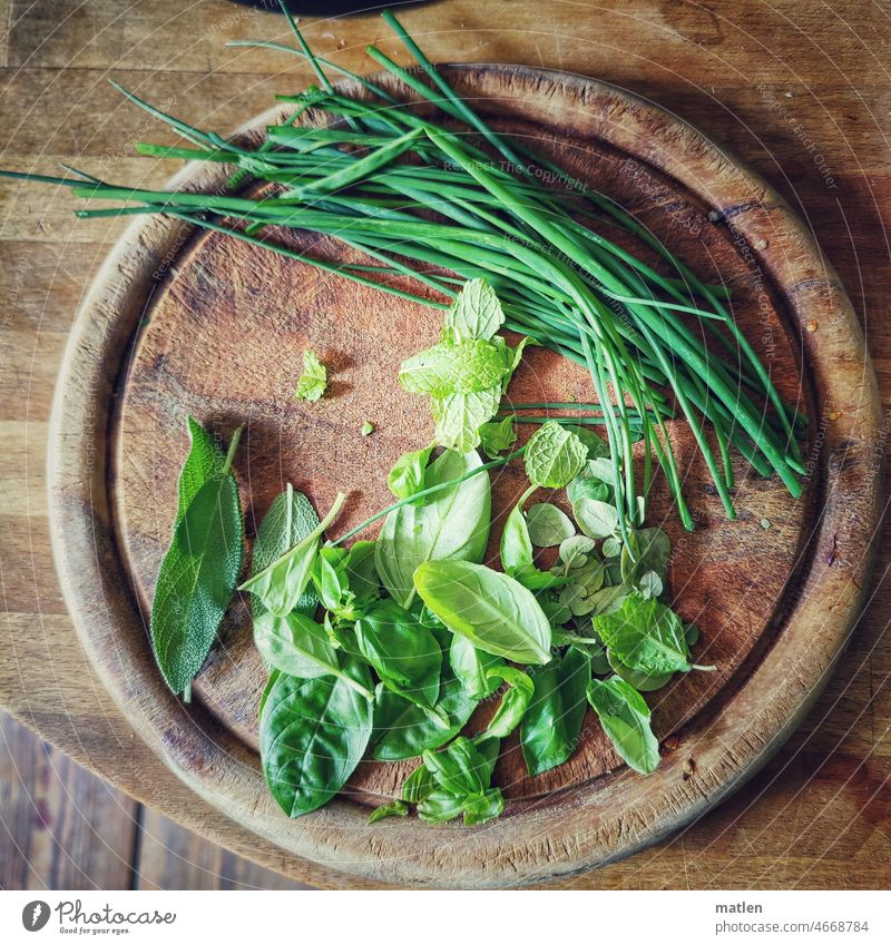 Herbs on kitchen board herbs Chives Sage Basil Cut Wooden board Herbs and spices Rustic Close-up Deserted Colour photo