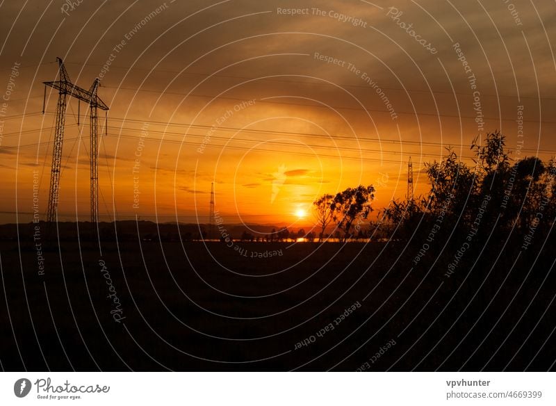 ELECTRICITY PYLONS green pylon blue voltage electrical electricity power connected nature metal sky wired high network field pole technology pylons wires energy