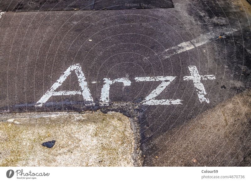 Parking only for doctor Doctor med Street Lot marking Asphalt Information Hint Reservation Area Weathered Old Tracks symbol