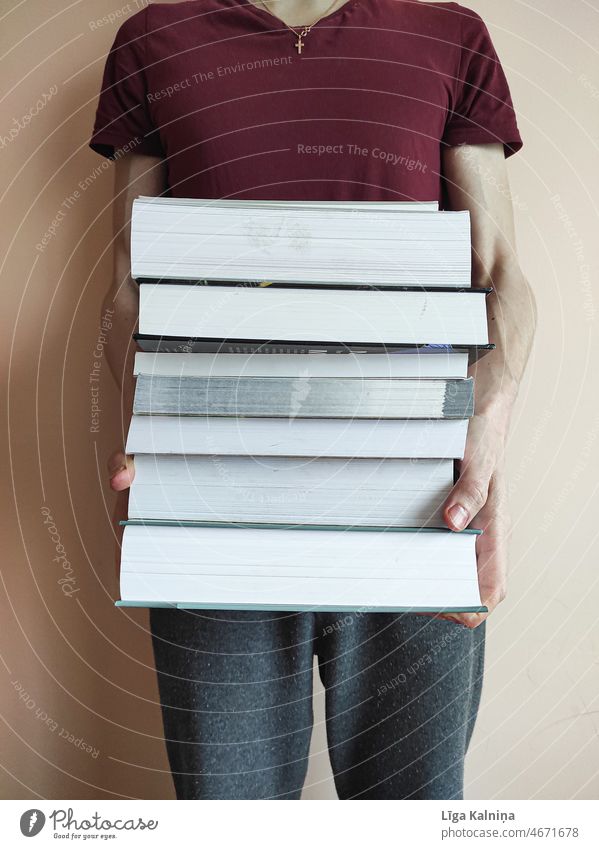 Man reading a stack of books or files Books pile of books Stack Literature Academic studies Study Reading matter Education book collection Collection