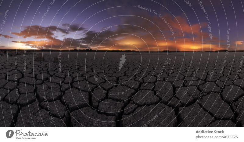 Amazing view of starry sky over desert milky way night terrain crack surface dry nature landscape sunset dark scenic astronomy galaxy universe picturesque