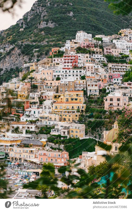 Buildings on slope of mountain near sea building town water coast house waterfront beach italy environment aqua europe shore seaside seashore scenery location