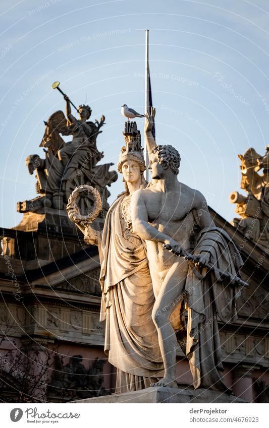 Statues of the castle bridge and Old Museum in the background Trip Tourism Copy Space middle touristic City life Contrast Copy Space bottom upside down