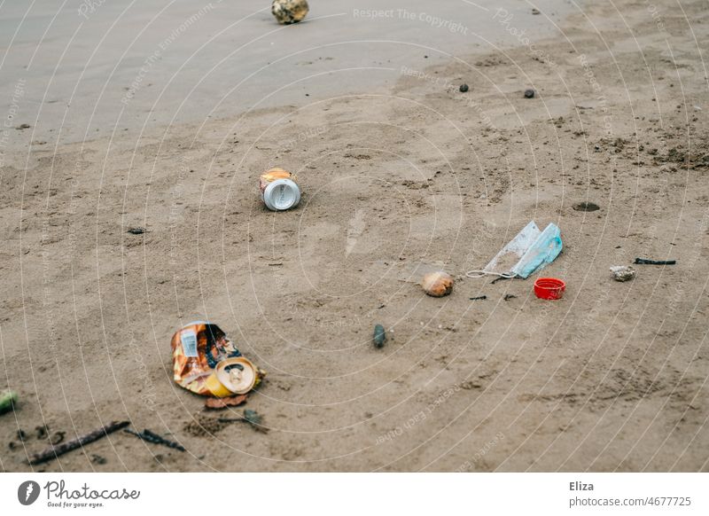 Garbage on the beach. Environmental pollution. Trash Beach Canned drink Recycling Sand filth Nature