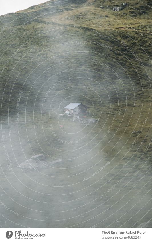 Fog in front of alpine hut Haze alphabet Willow tree Alps Switzerland House (Residential Structure) alps Clouds Moody stones Meadow